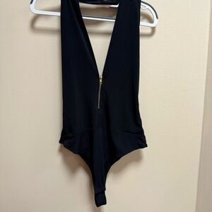 Haute Monde Black Bodysuit with Gold Zipper. 
Thong Size Lg